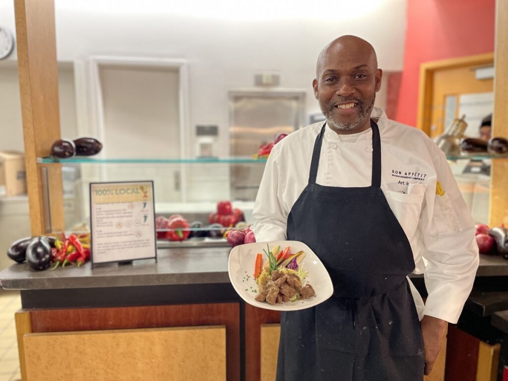 A chef shows off his creative use of local ingredients for a food service company's Eat Local Challenge