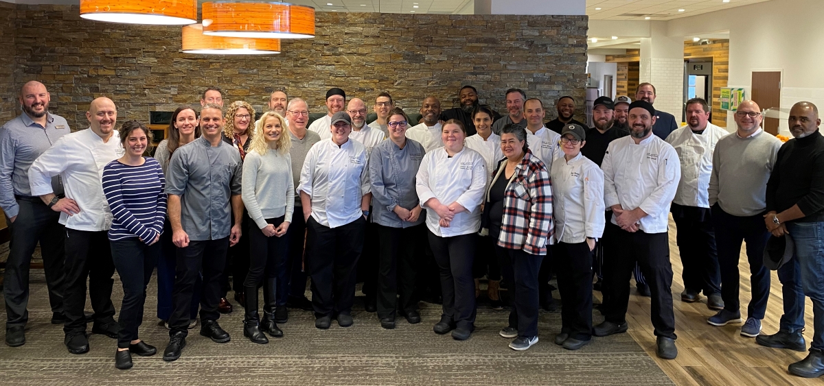 Members of the Southeast-Midwest Region Plant-Forward Culinary Collaborative pose during a plant-forward training at Denison University