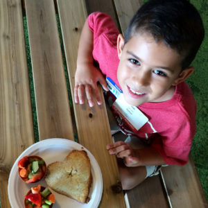 Boy with hand pie
